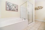 Master bath with walk-in shower and tub